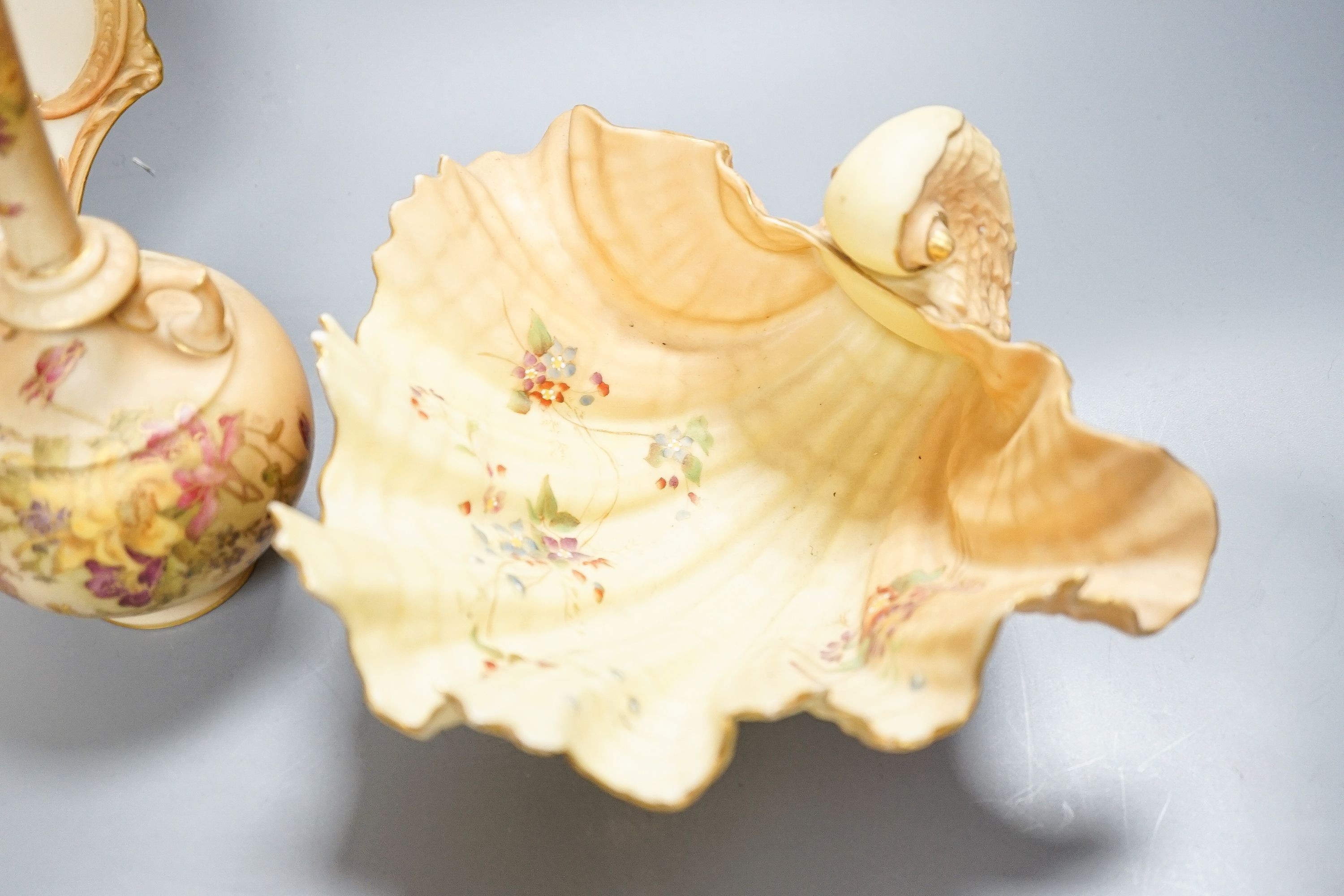 A group of ornamental Royal Worcester blush ivory ground items, including a shell dish, 18cm wide, two vases, a dish etc.